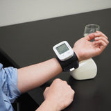 iHealth StartbyiHealth Wrist Blood Pressure Monitor on a person's wrist